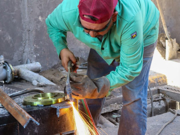 Mejora Comapa eficiencia de pluvial con trabajos de mantenimiento en el paso a desnivel no. 1