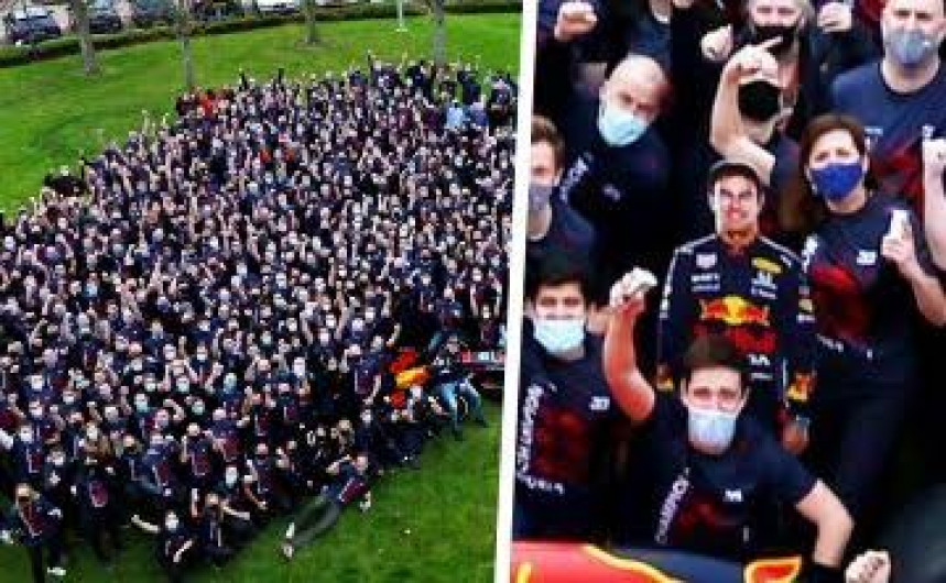 Festejan triunfo de Verstappen con figura de Checo Pérez de cartón