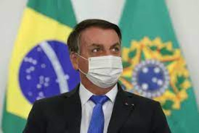 Pese a récord de muertes, Bolsonaro descarta confinamiento en Brasil